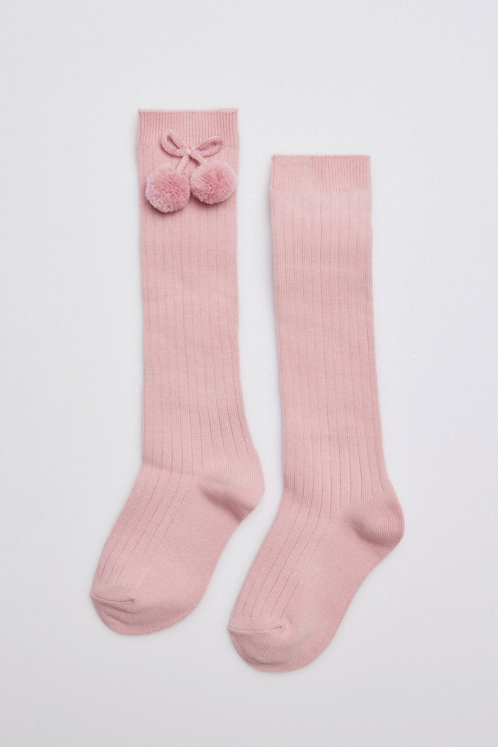 Chaussettes hautes enfant roses détails pompons