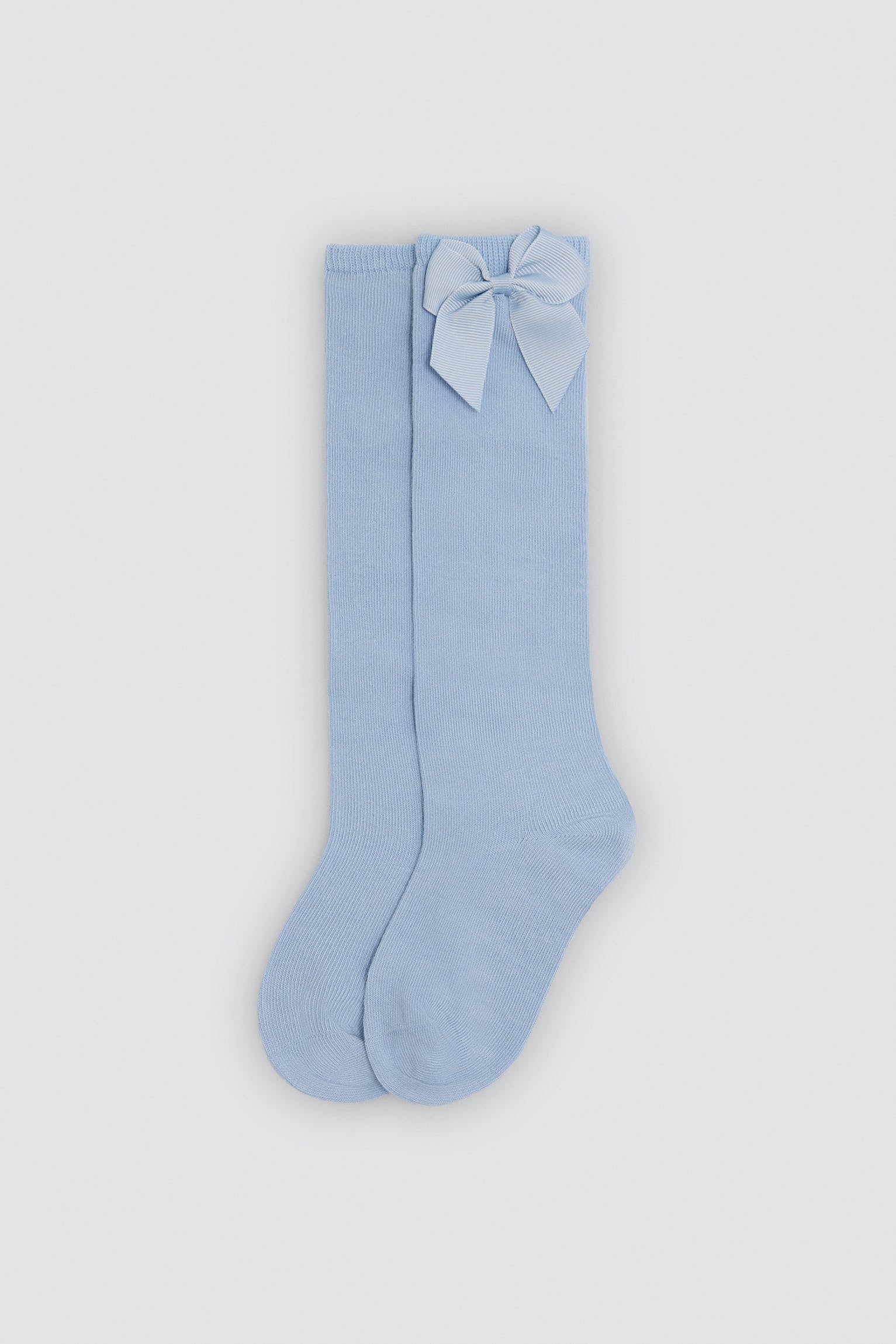 Chaussettes hautes enfant bleues détail nœud