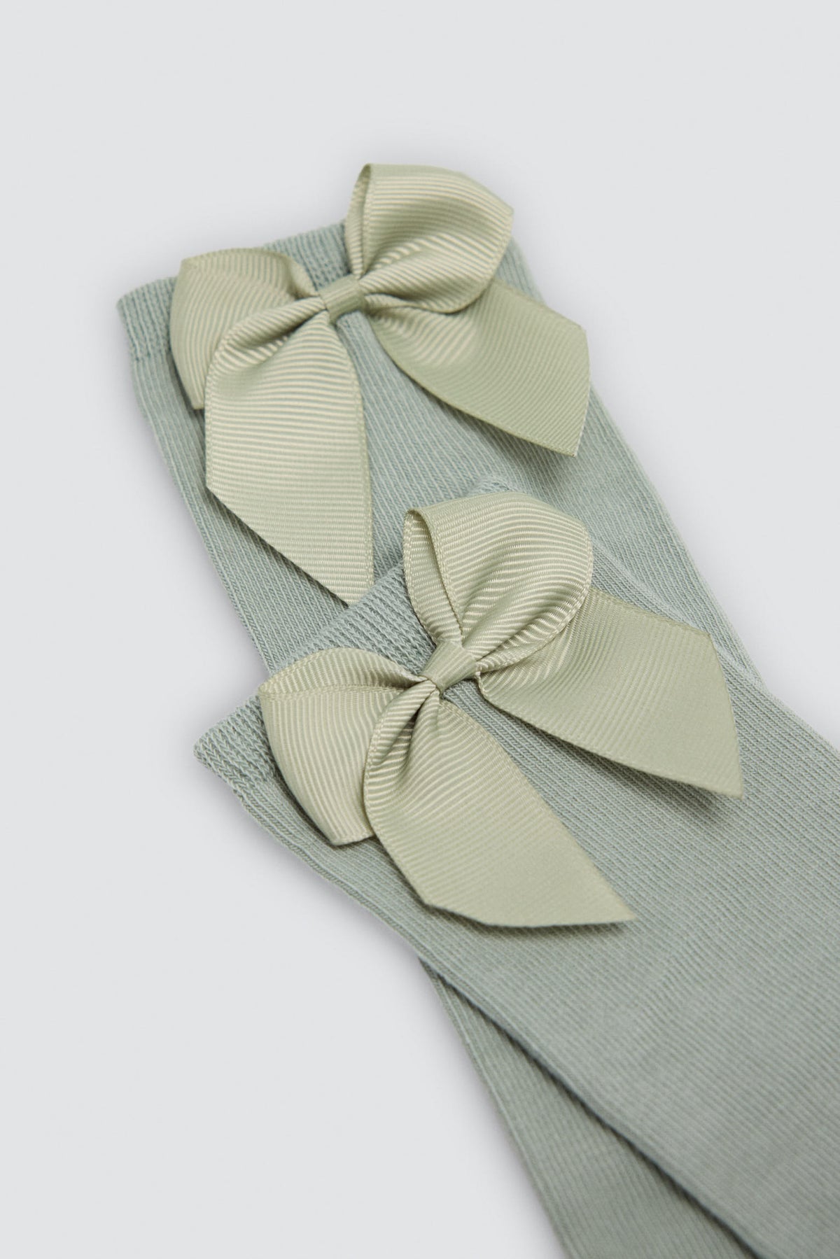 Chaussettes hautes enfant vertes détail nœud