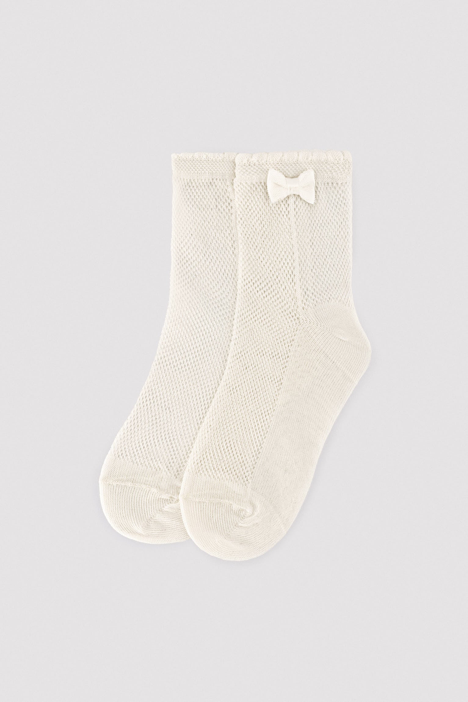 Chaussettes ajourées pour enfants avec détail de nœud ivoire