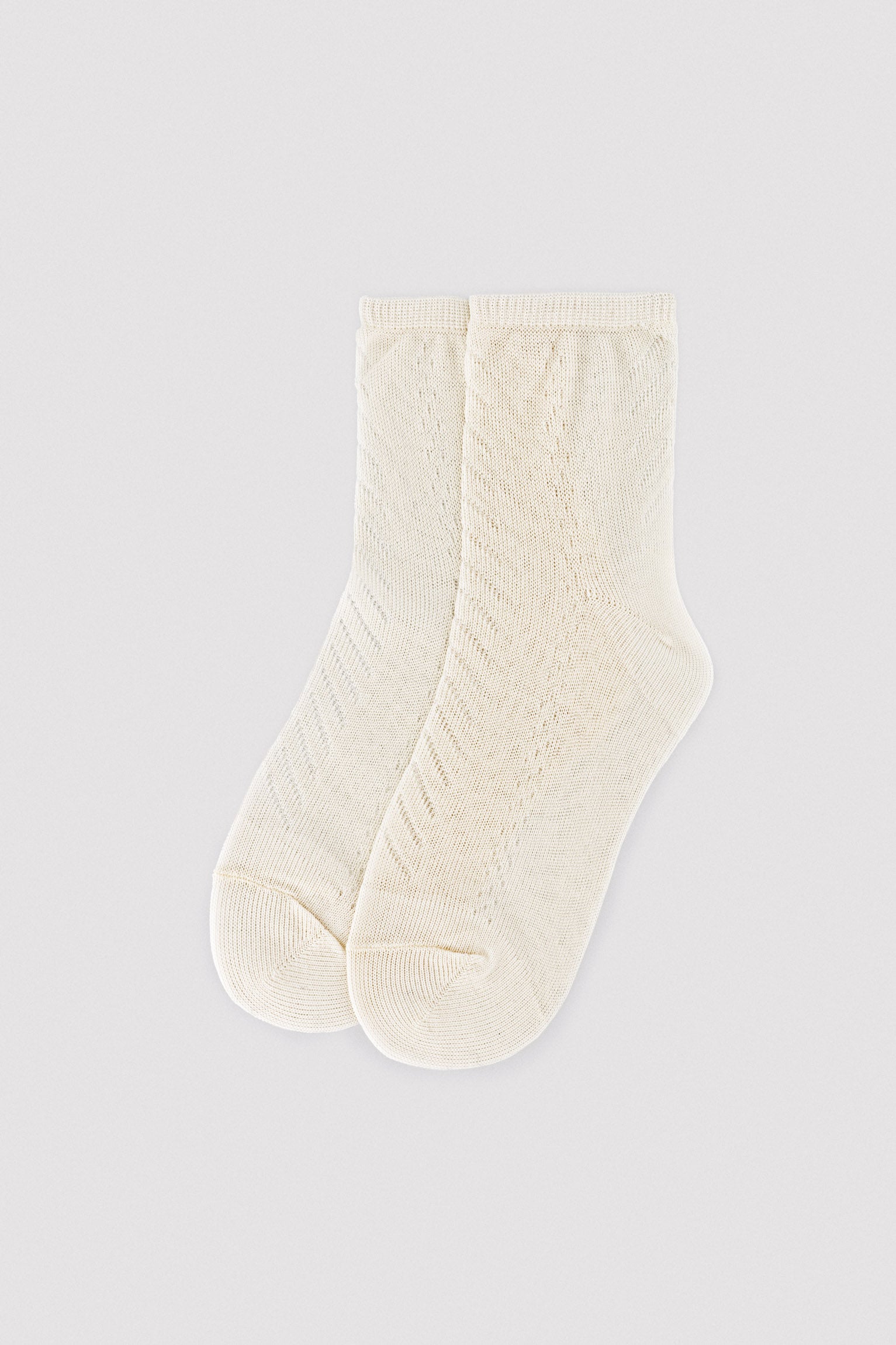 chaussettes ajourées ivoire pour enfants