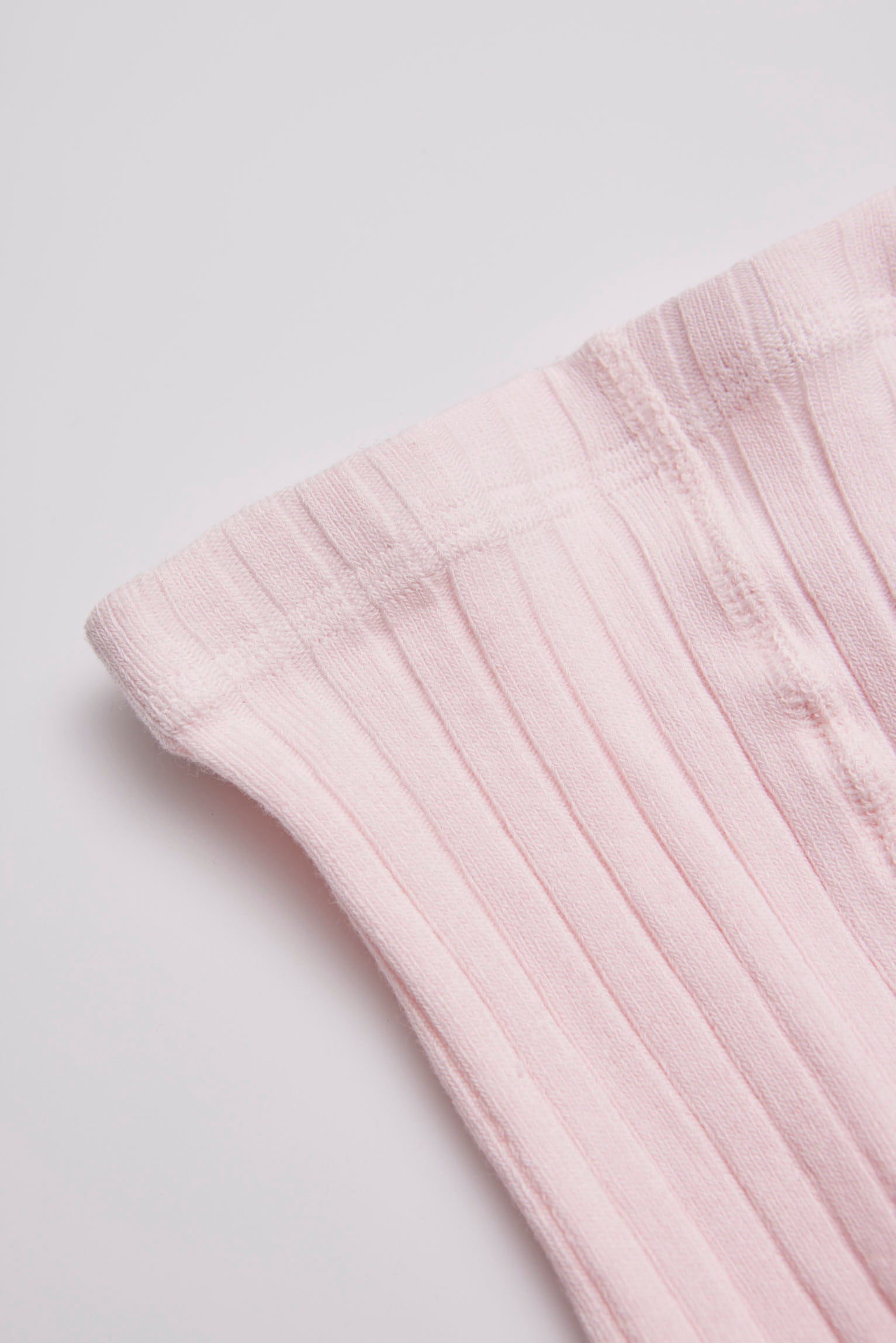 Justaucorps côtelé rose pâle