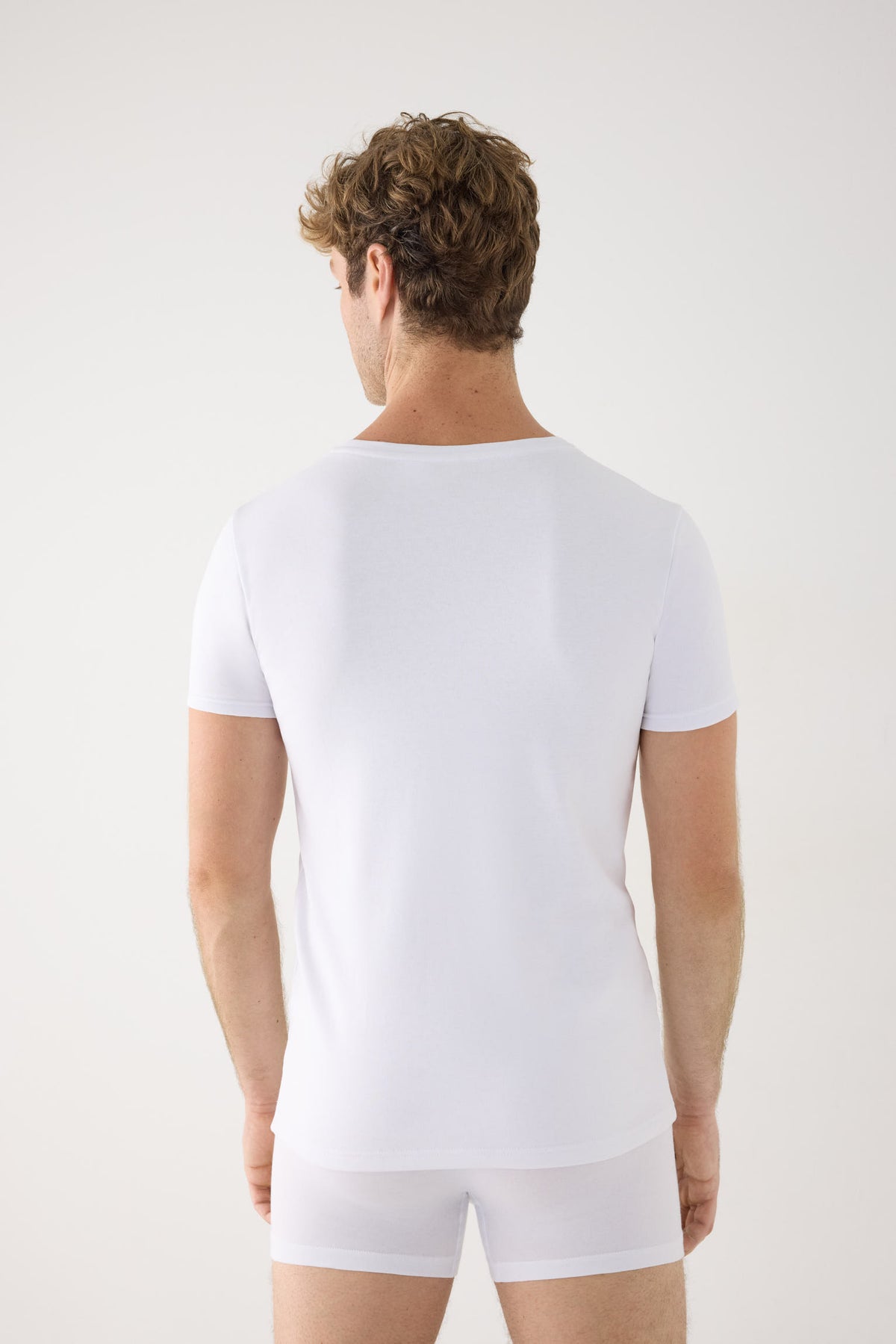 T-shirt thermique léger à manches courtes pour homme, en coton blanc.