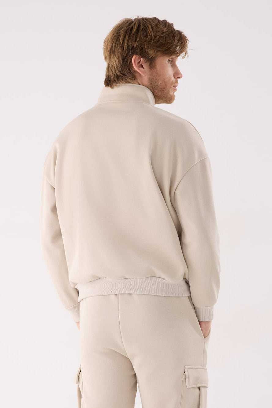 PRÉCOMMANDE Sweat sport homme beige molletonné demi-zip