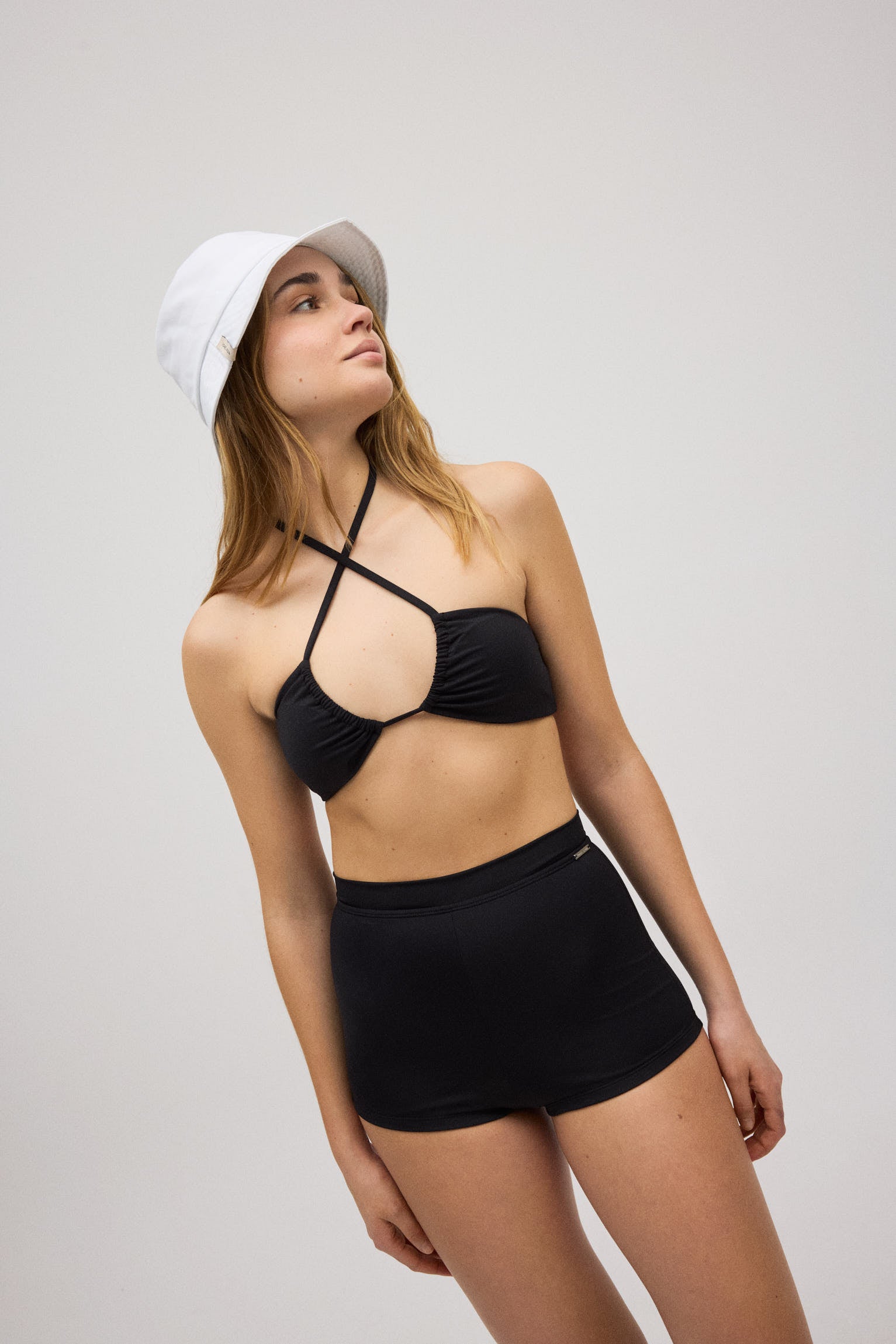 Swim your story - Haut de bikini multipositions et short noir Collection Zanzibar