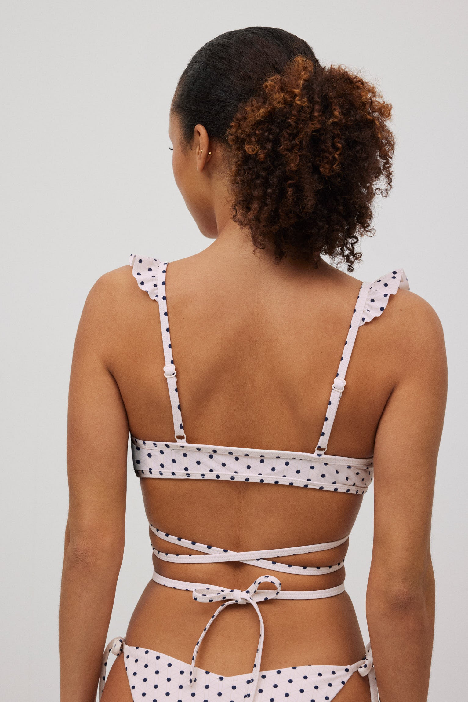 82890-2-top-triangulo-estampado-lunares-mujer-ysabel-mora-blanco