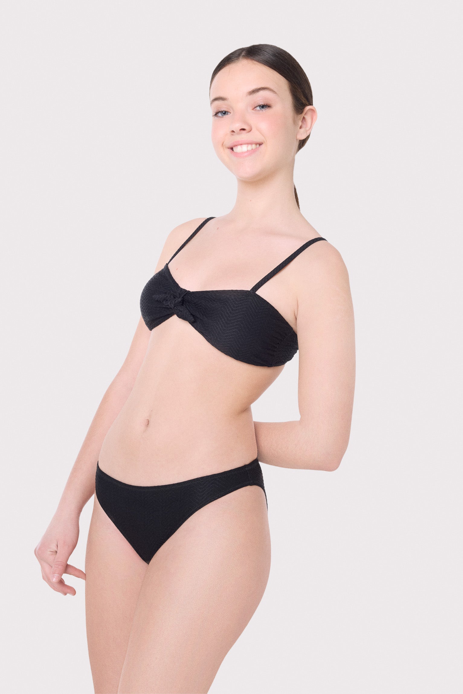 Bas de bikini Juveni noir lisse à texture