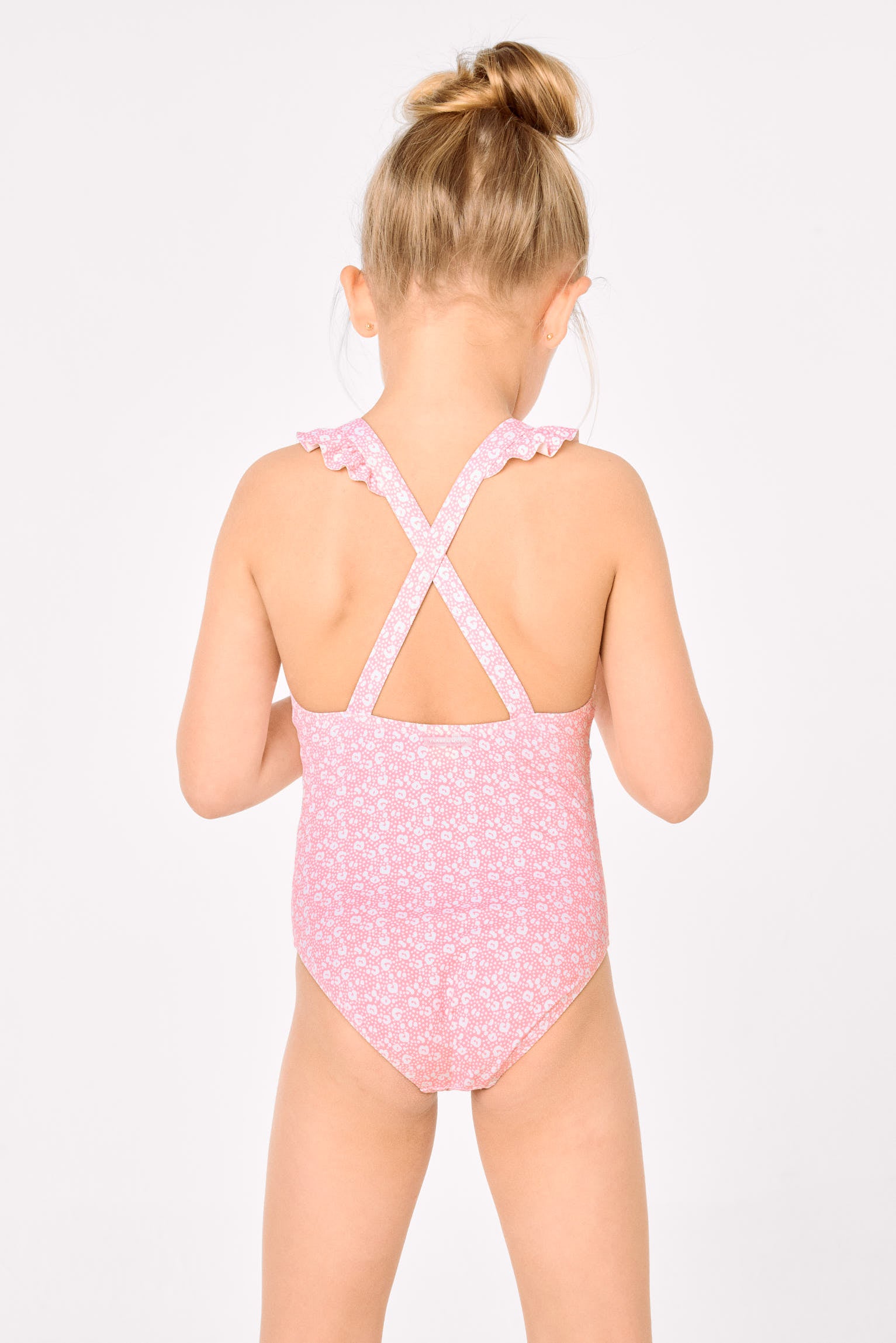 Bañador niña detalles volantes y tirantes cruzados estampado leopardo rosa - Ysabel Mora