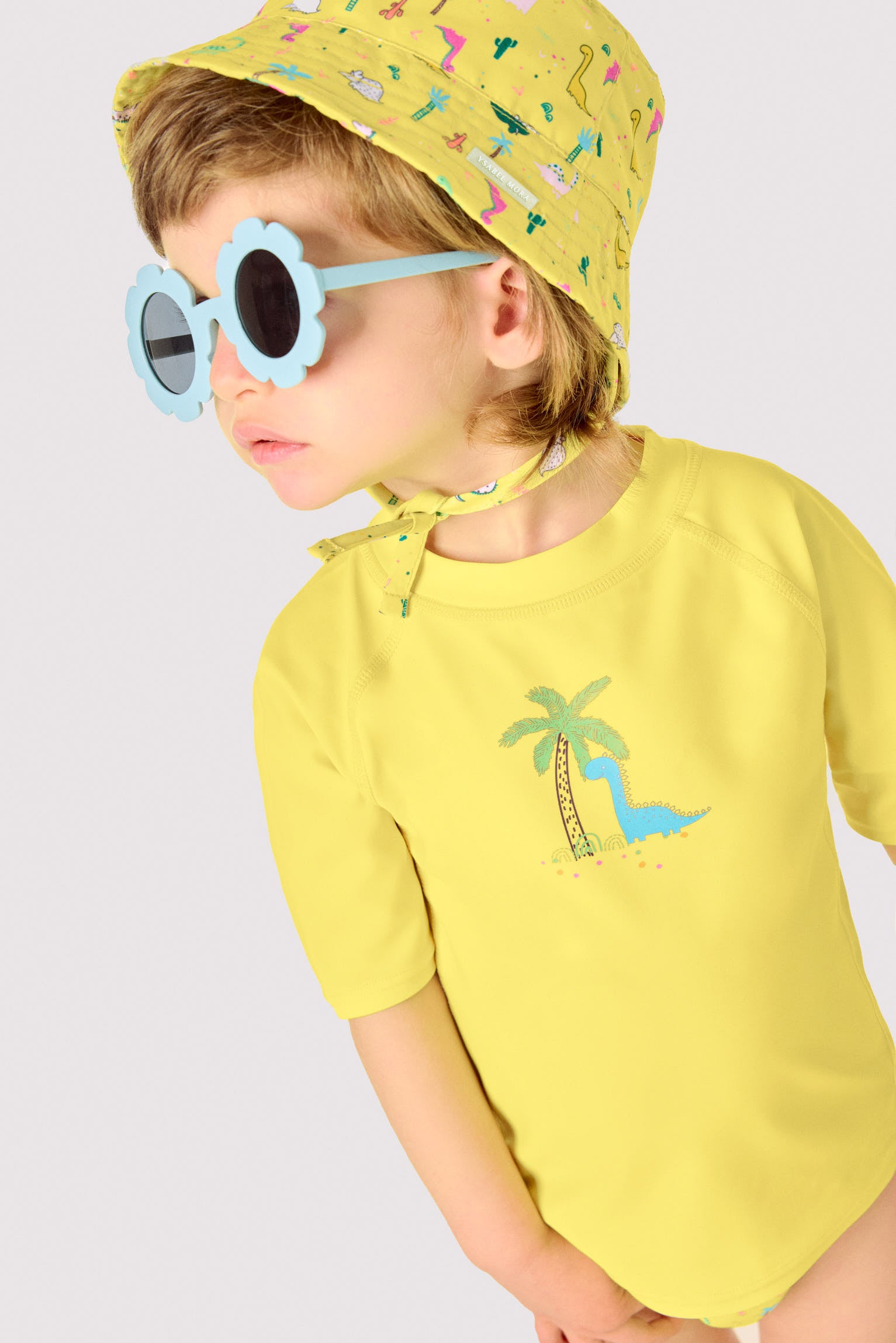 Gorro de playa bebé ala recta estampado dinosaurios - Ysabel Mora