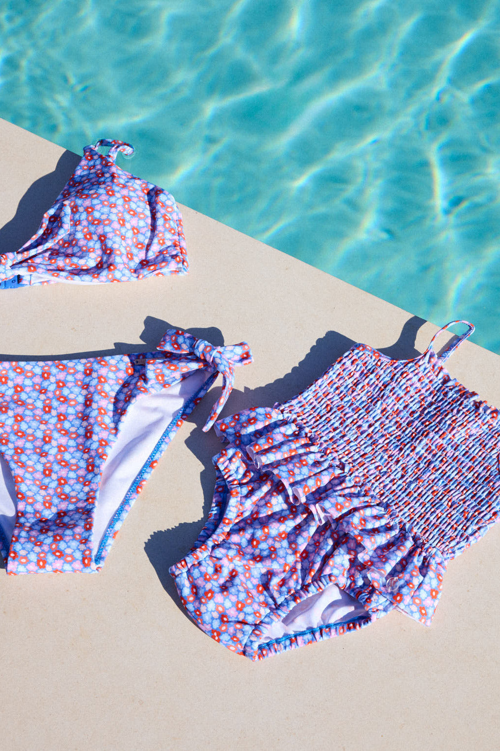 Maillot de bain bébé nid d'abeille petites fleurs