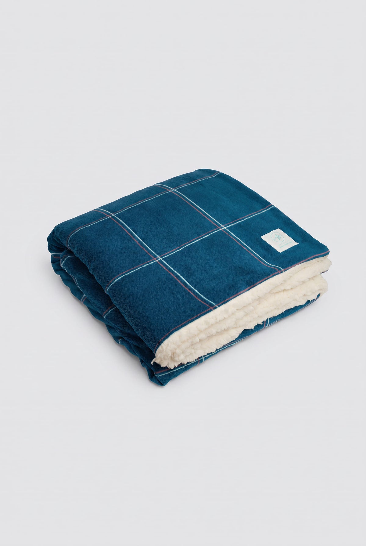 Plaid effet mouton à carreaux