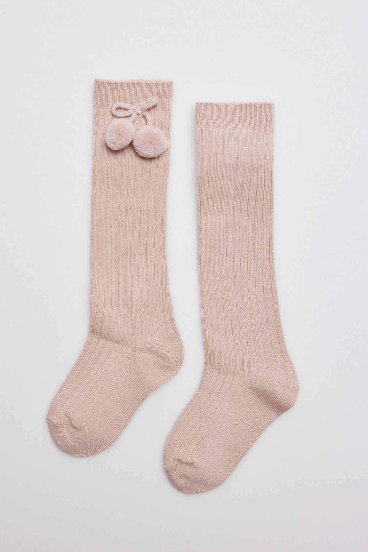 Chaussettes hautes enfant beiges détails pompons