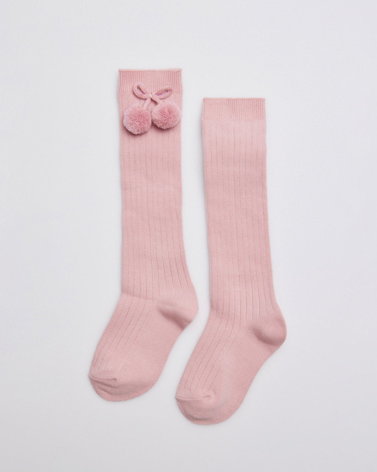 Chaussettes hautes enfant roses détails pompons