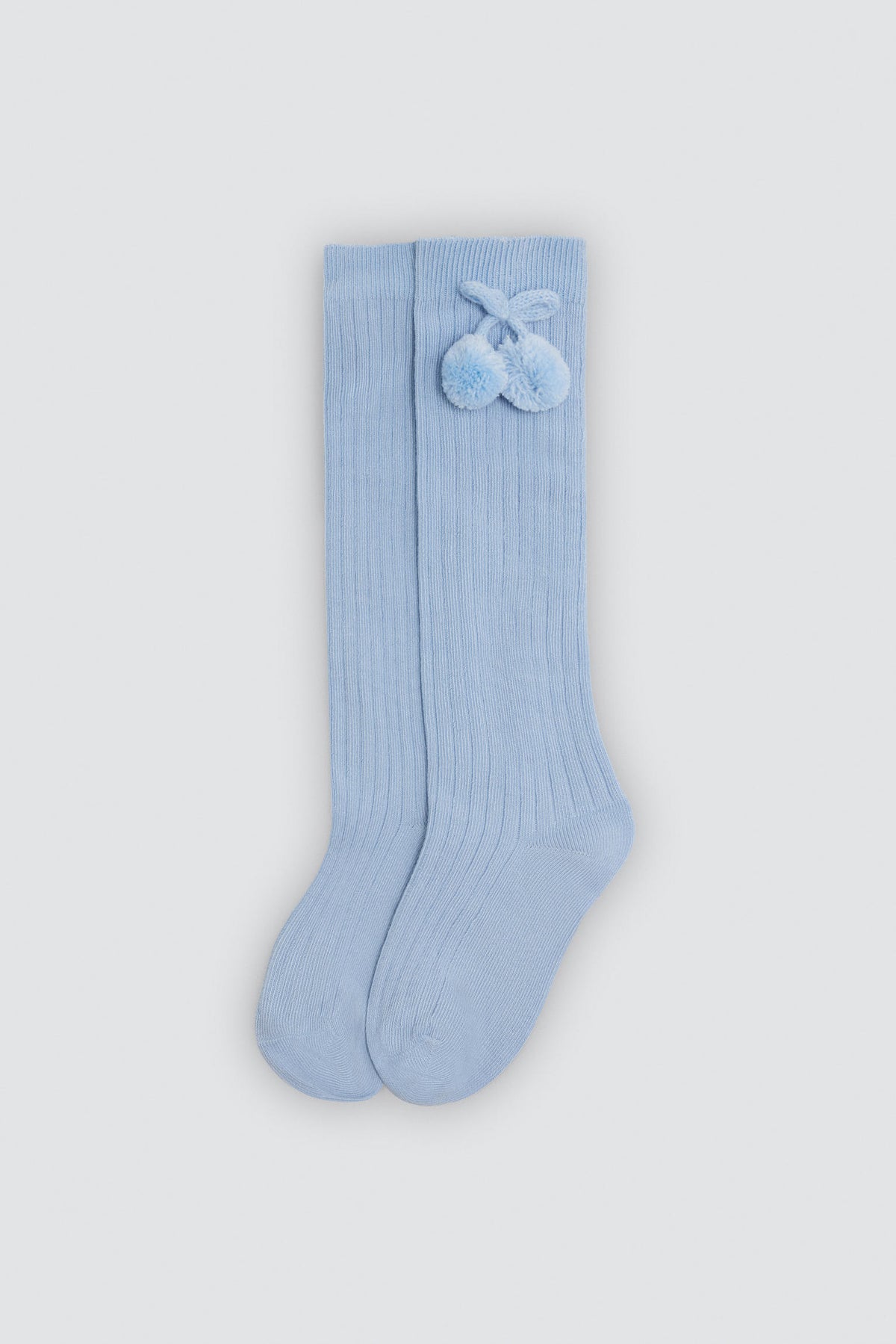 Chaussettes hautes enfant bleues détails pompons