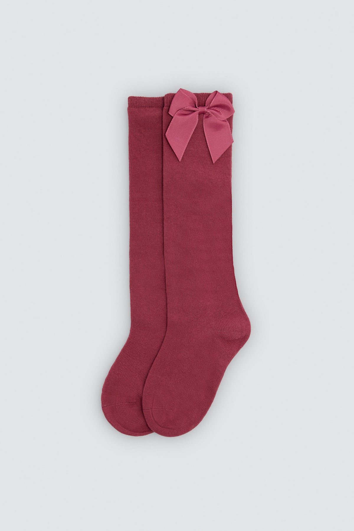 Chaussette longue pour enfant avec détail nœud rose