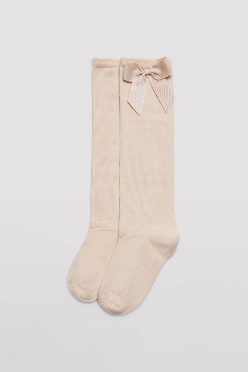 Chaussette longue pour enfant avec détail nœud beige