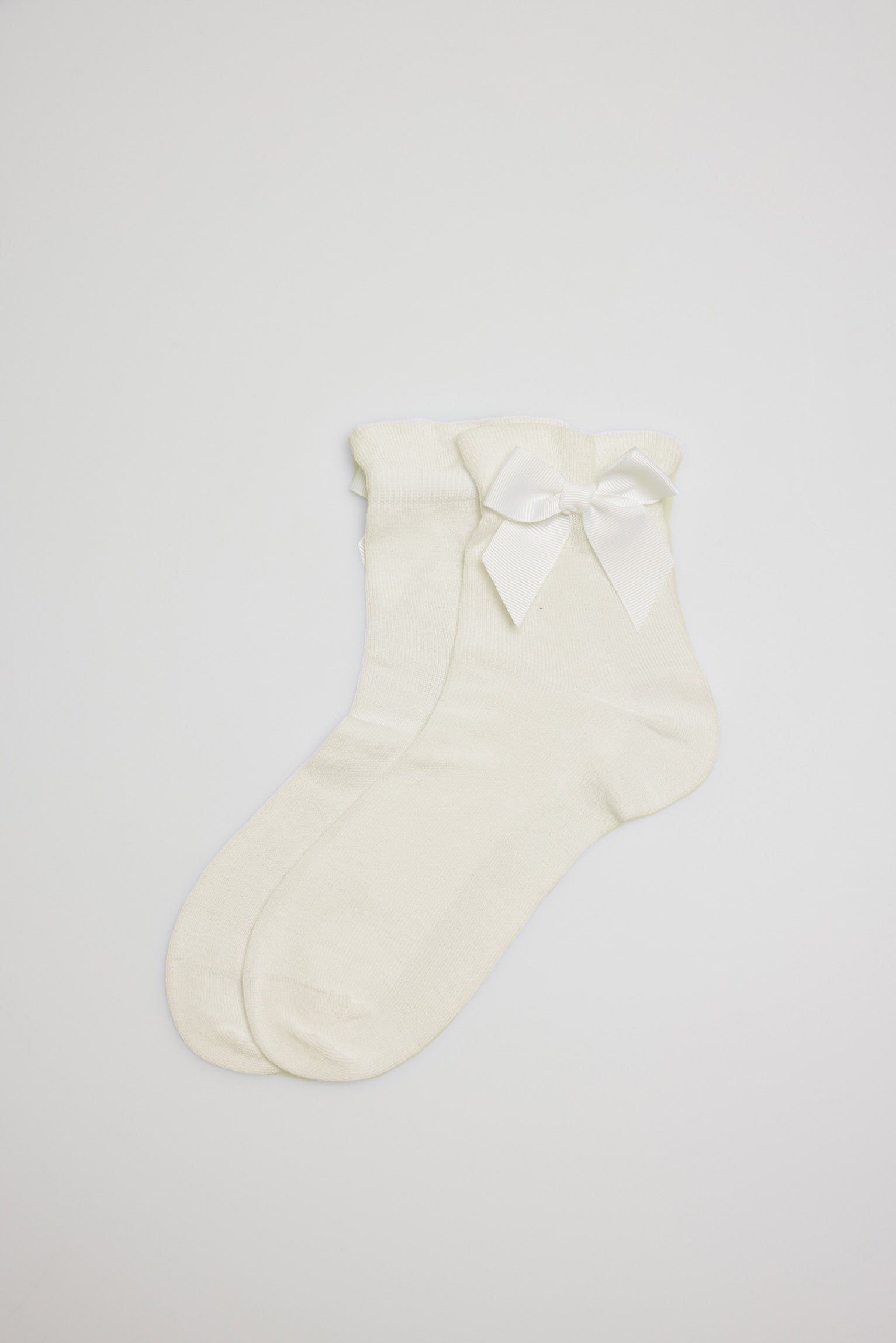 Chaussettes de cérémonie du noeud pour enfants en ivoire