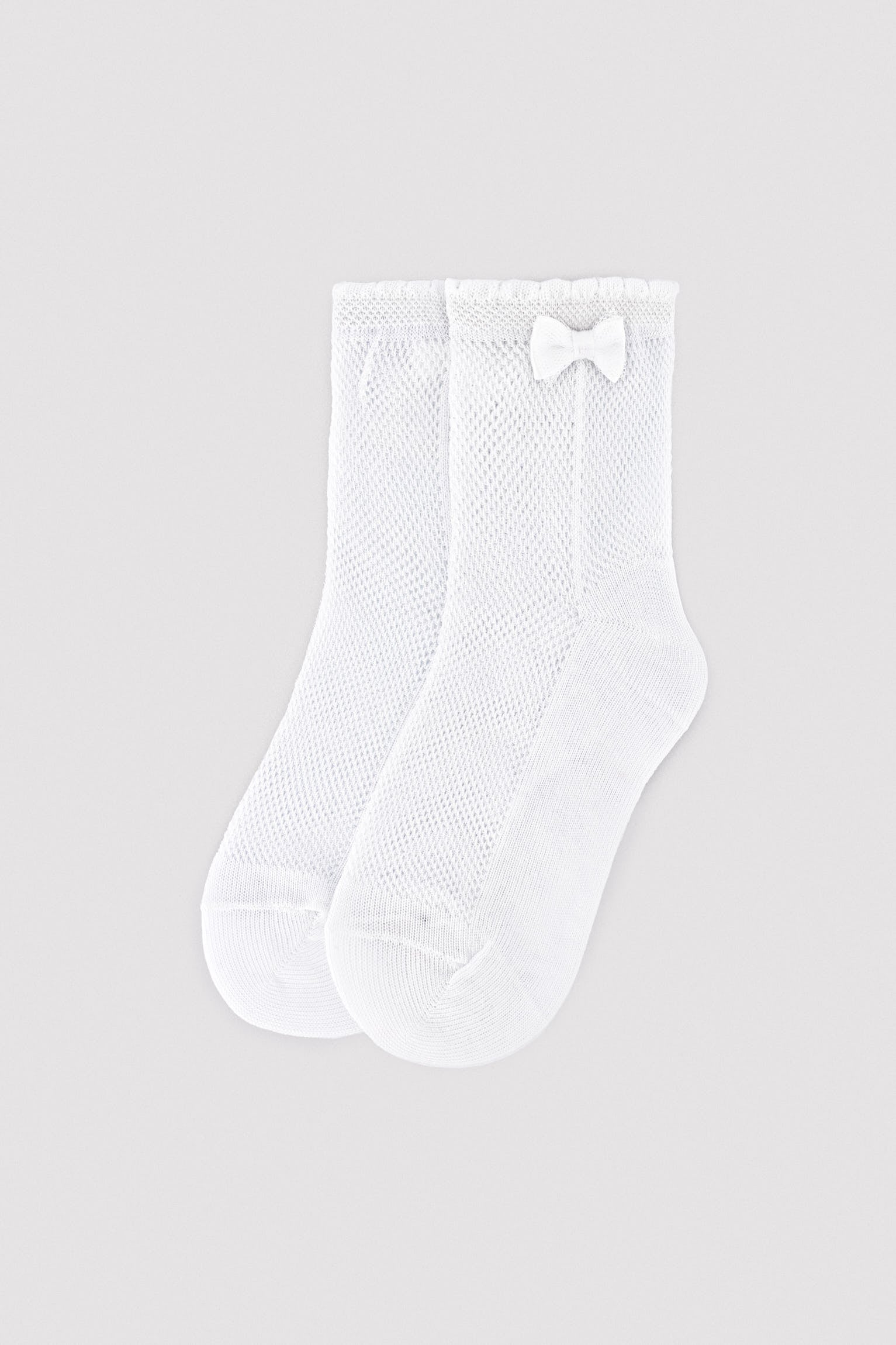 Chaussettes ajourées pour enfants avec détail de nœud blanc