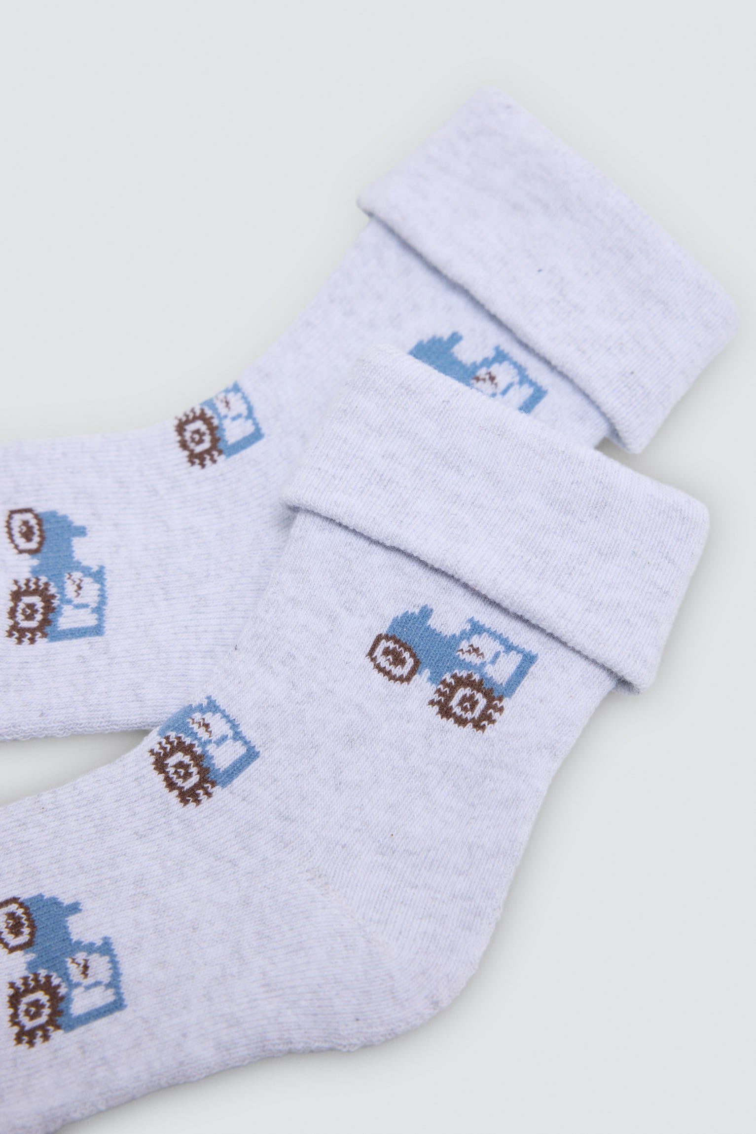 Lot de 4 chaussettes thermiques bébé imprimé tracteurs et cochons