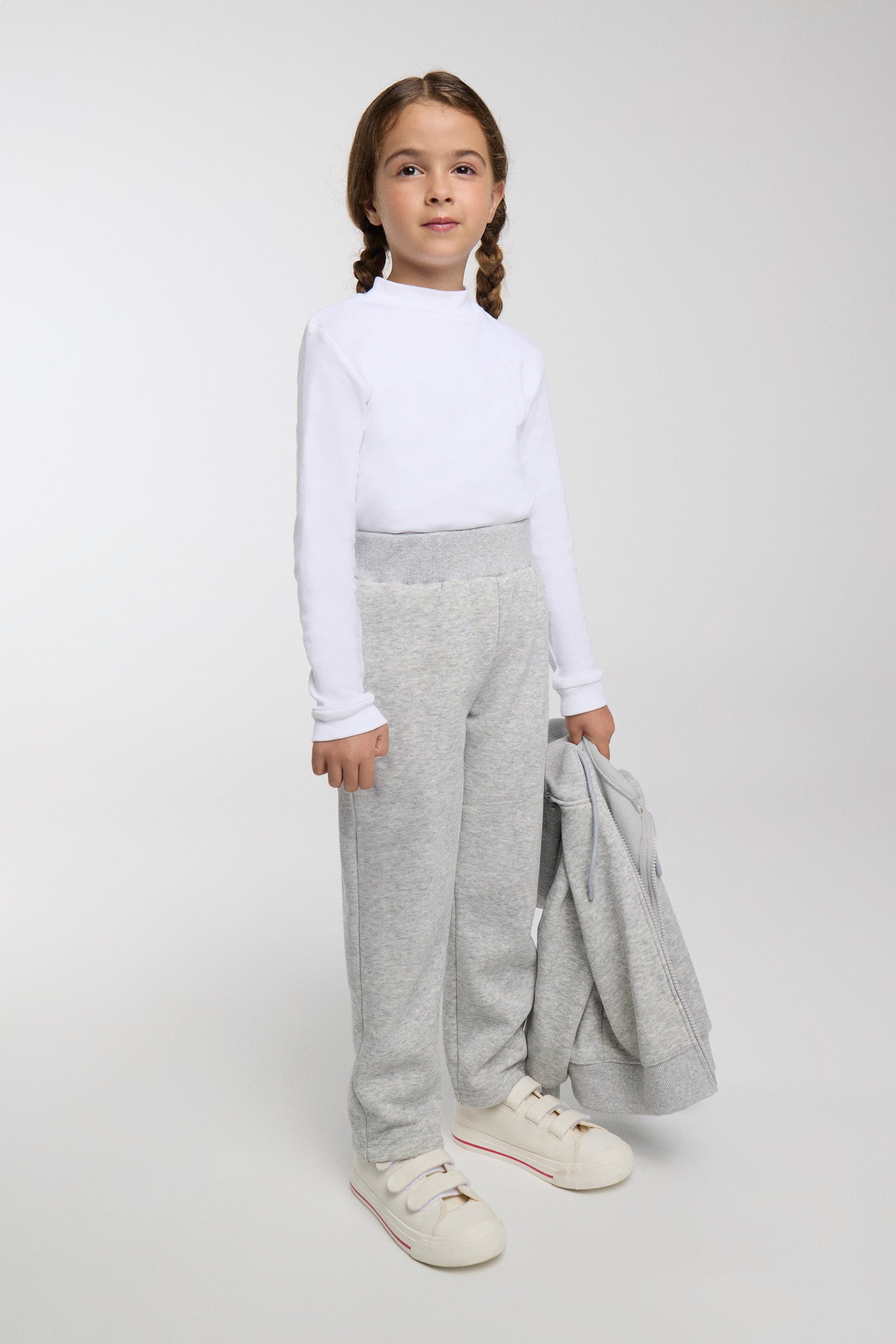 Chándal de niña gris jaspeado afelpado con chaqueta con cremallera, bolsillos y pantalón de corte recto
