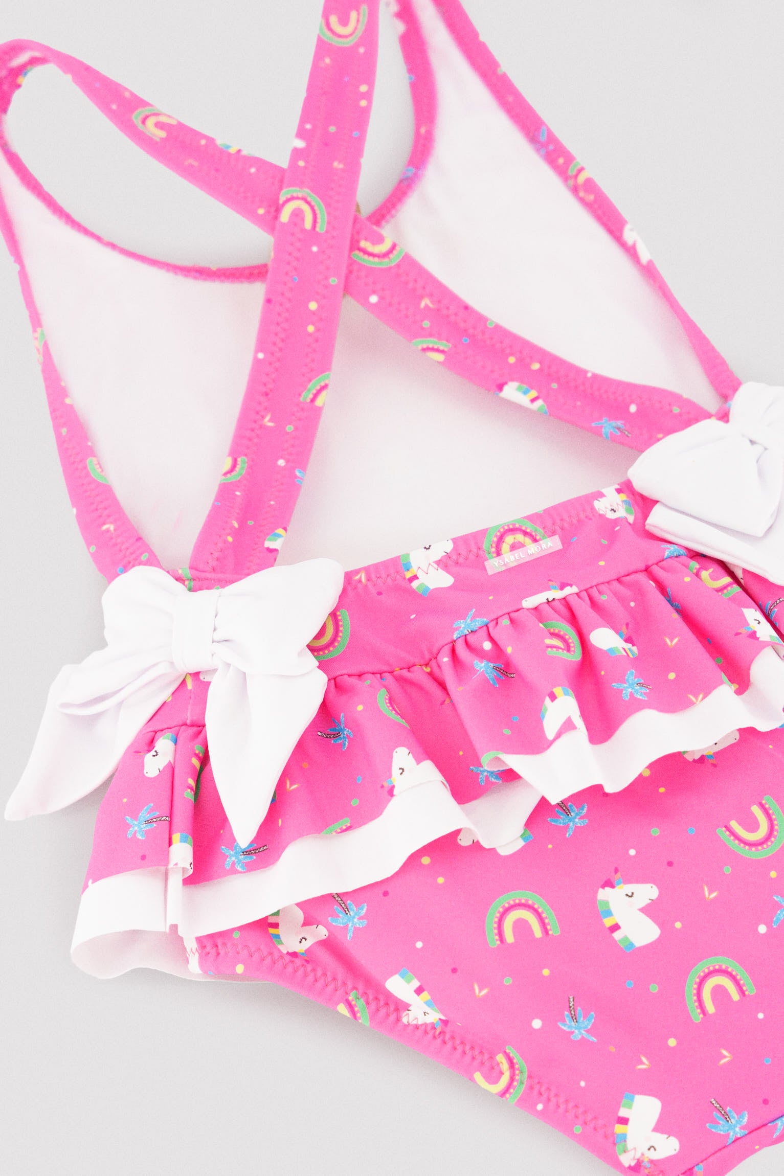 Bañador niña detalles volantes y lazos estampado unicornios - Ysabel Mora