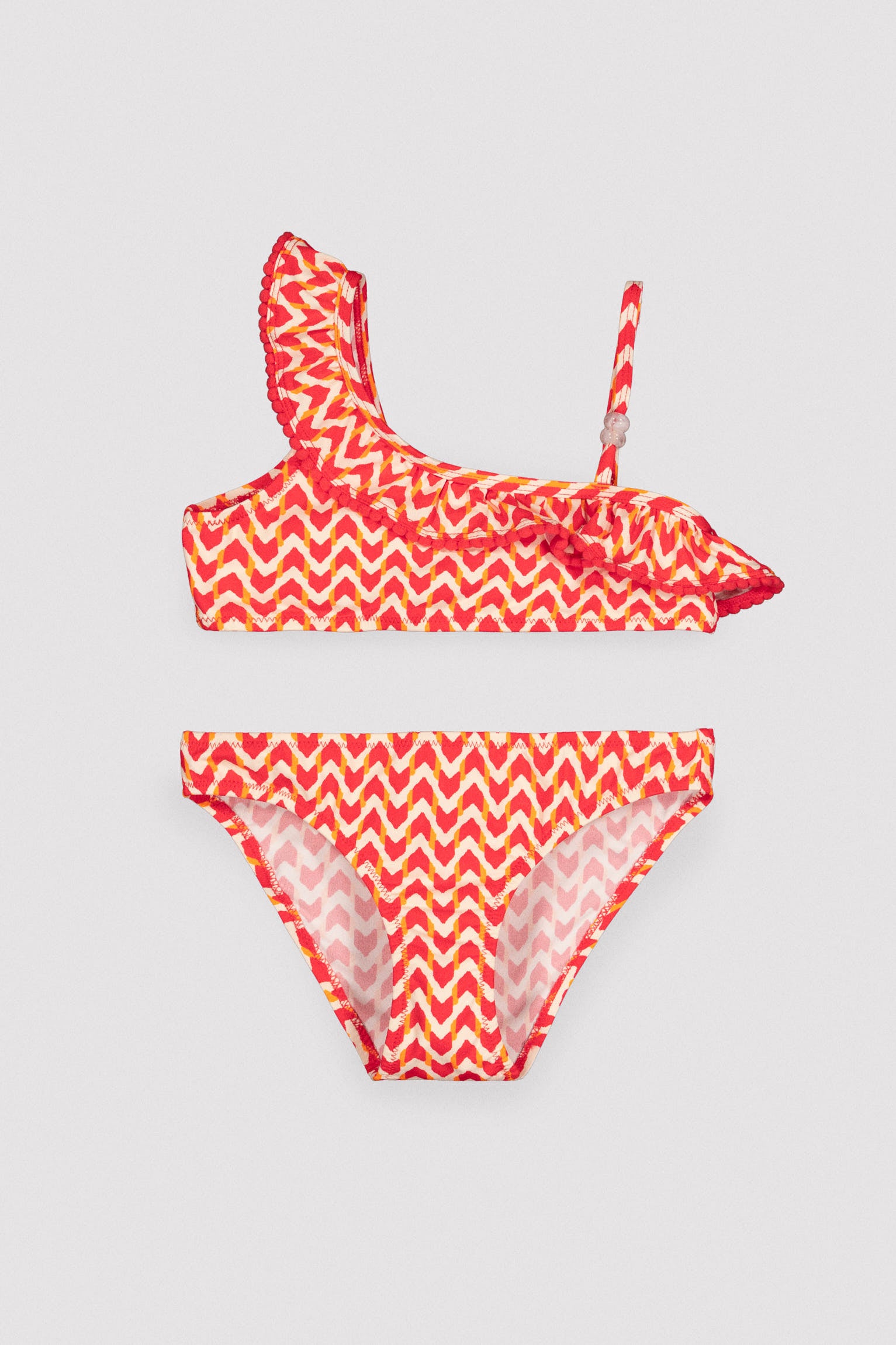 Bikini niña asimétrico detalle volante estampado étnico - Ysabel Mora
