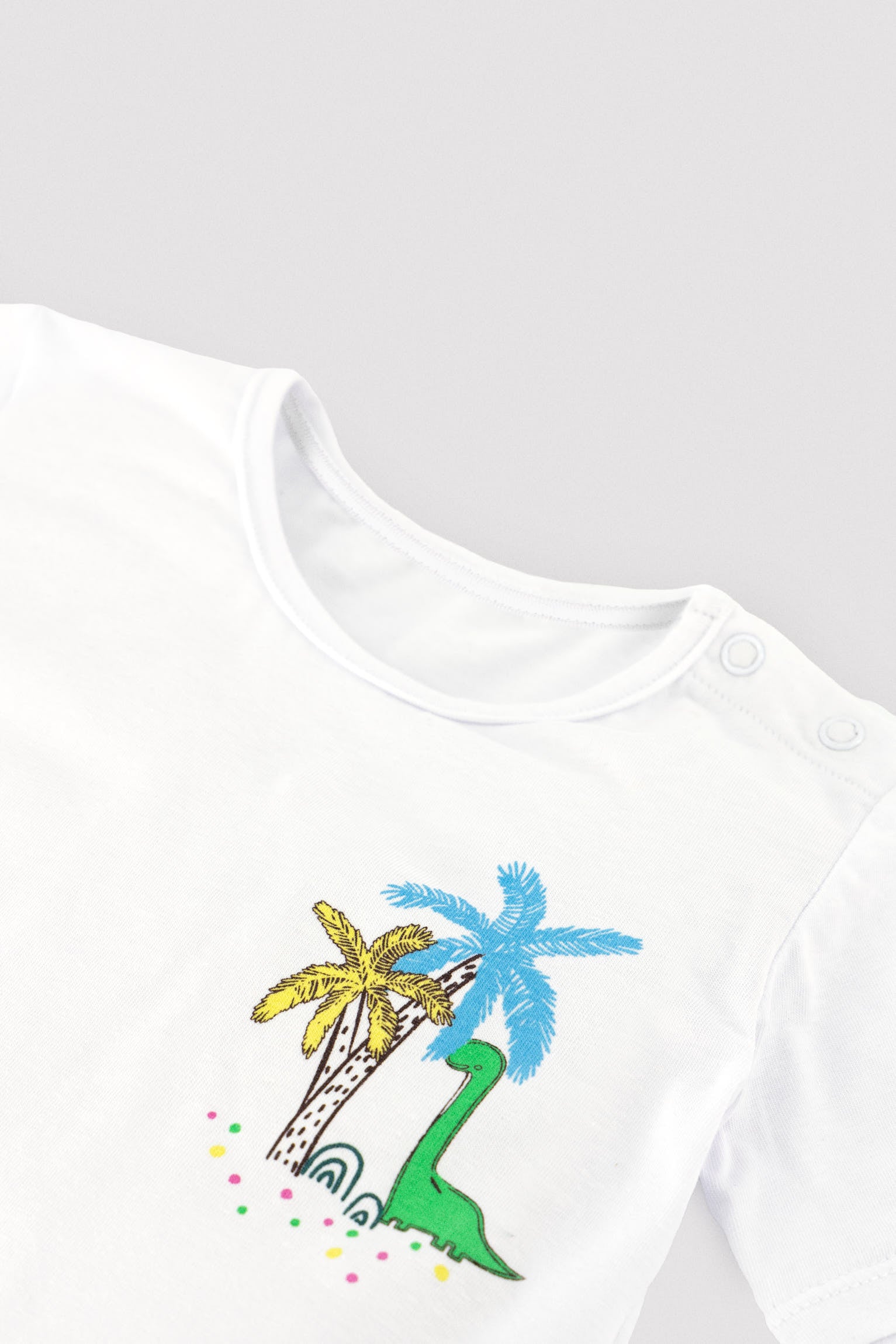Conjunto camiseta y bañador bóxer bebé estampado dinosaurios - Ysabel Mora