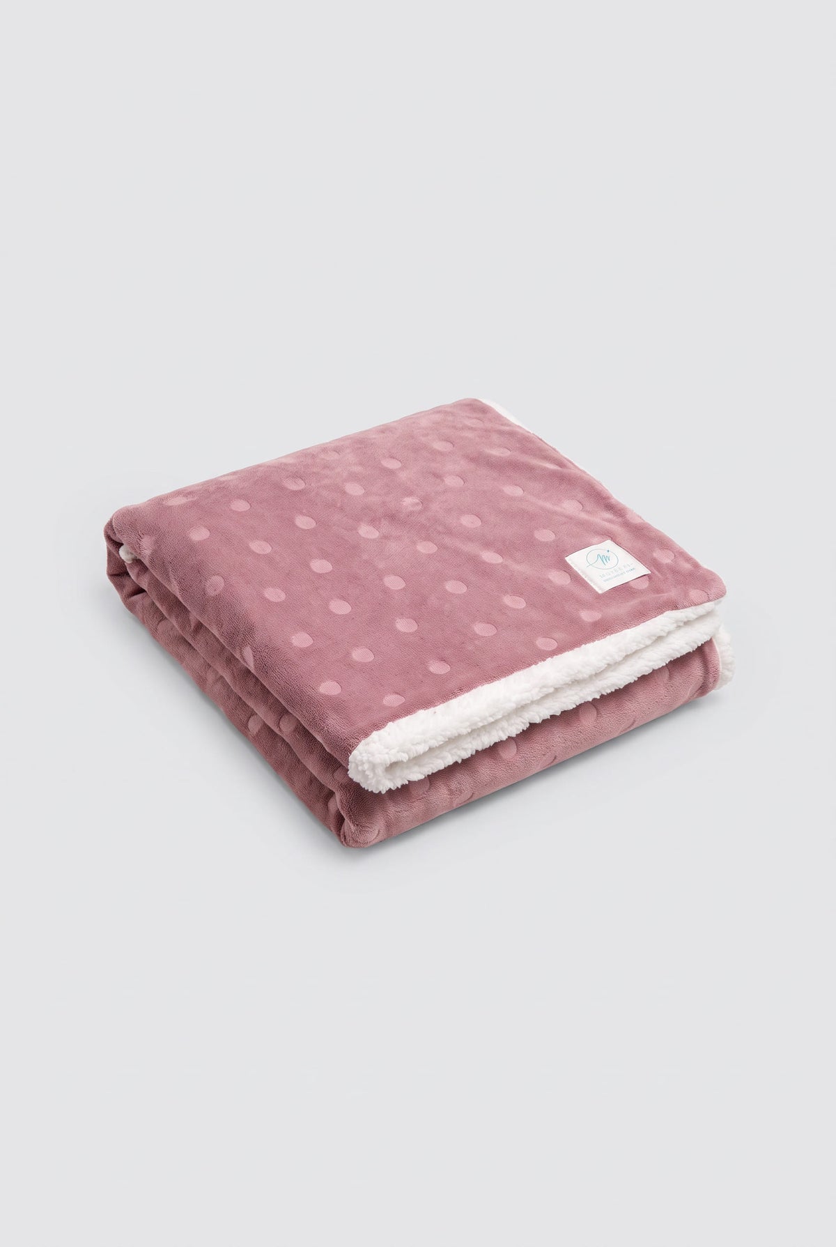 Plaid à pois en polaire corail et effet mouton