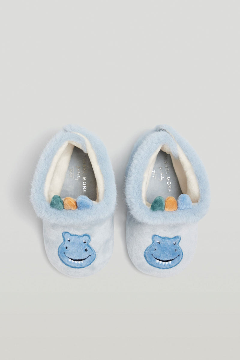Les bottes de la maison de bébé Les dents de bébé